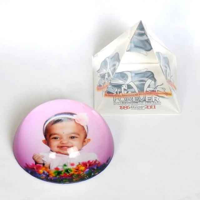A crystal dome holding a printed baby photo, made at Sun & Sand Studio