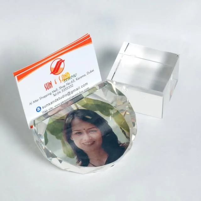 Photo crystal beside the studio's business card holder